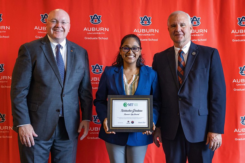 President Roberts and Dean Flowers with a student award winner