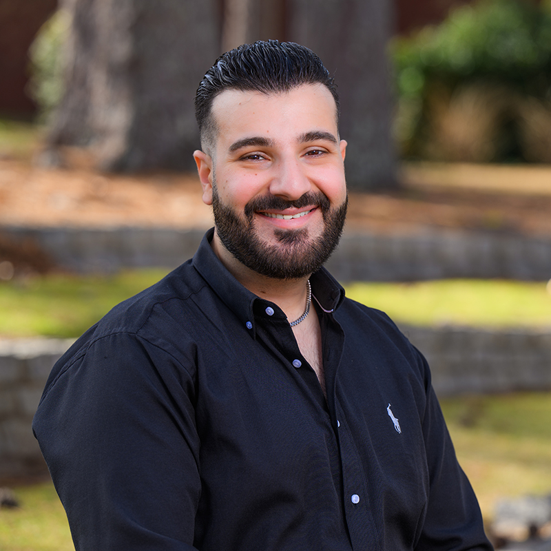 photo of Rudy Al Ahmar in blue shirt