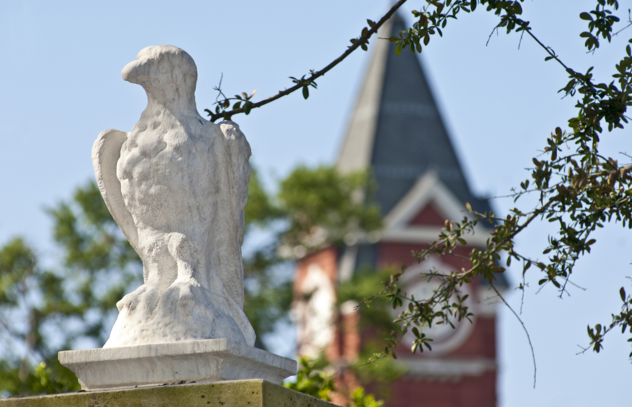 Eagle statue in front of Samford Hall clock tower